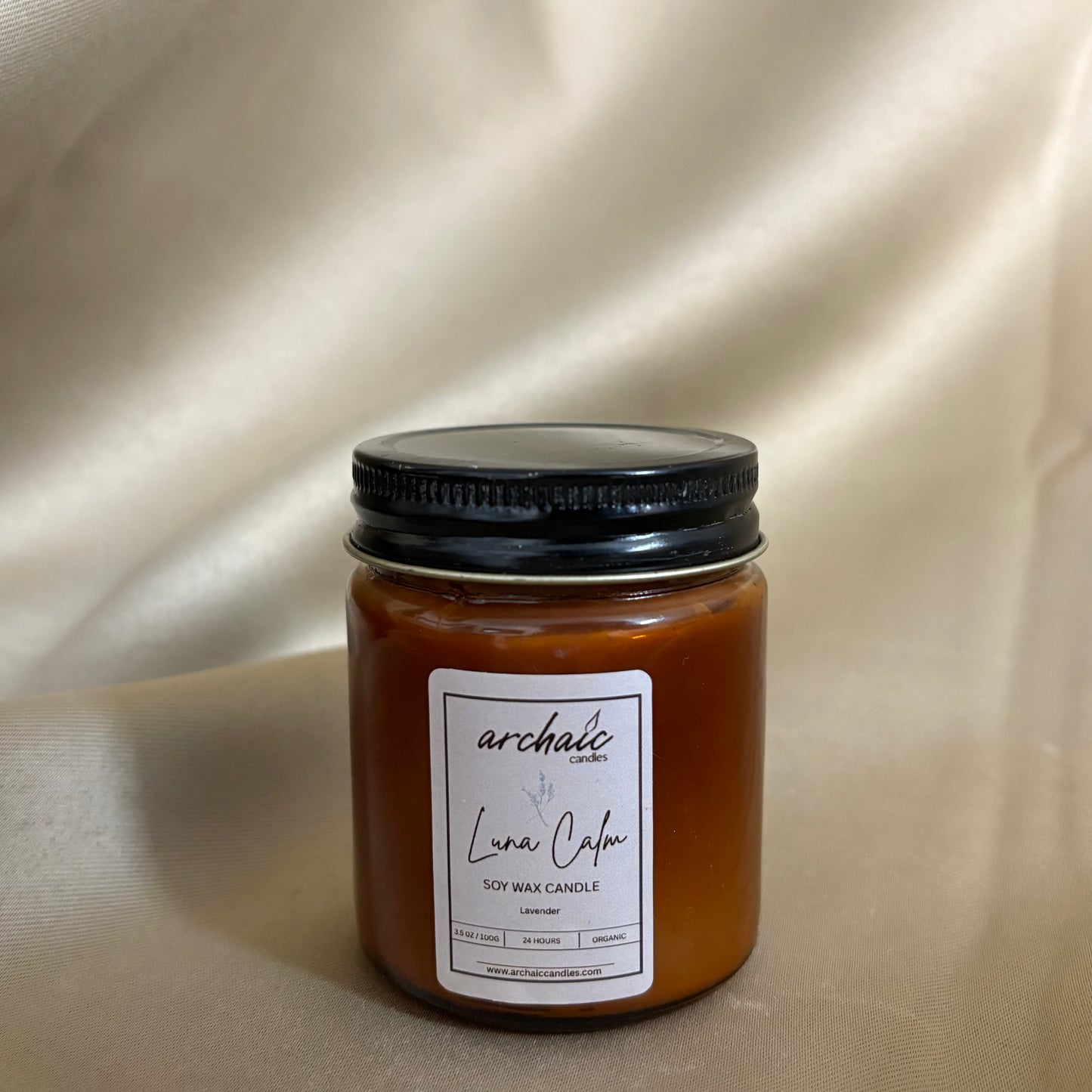 Close-up of cotton wax-braided wick on Luna Calm lavender soy candle, 100 gm