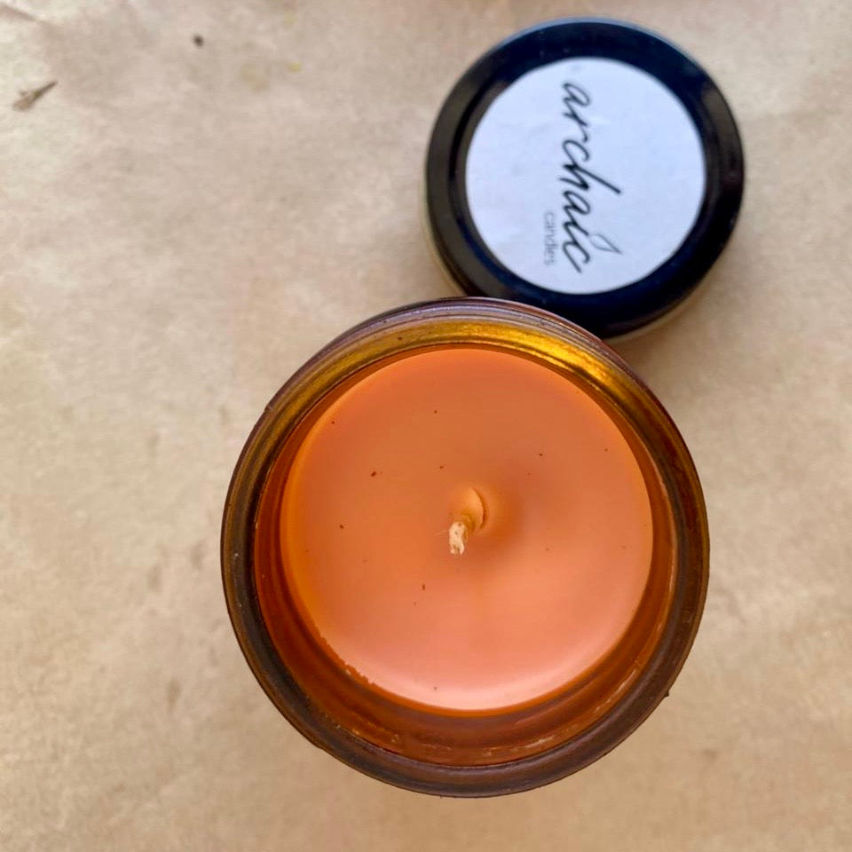 Top view of Silk Noir vanilla soy candle in amber glass, 100 gm, smooth 24-hour burn surface